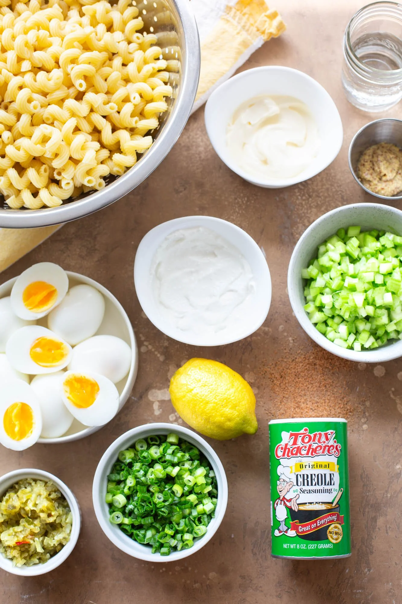 Ingredients laid out to make Cajun deviled egg pasta salad.