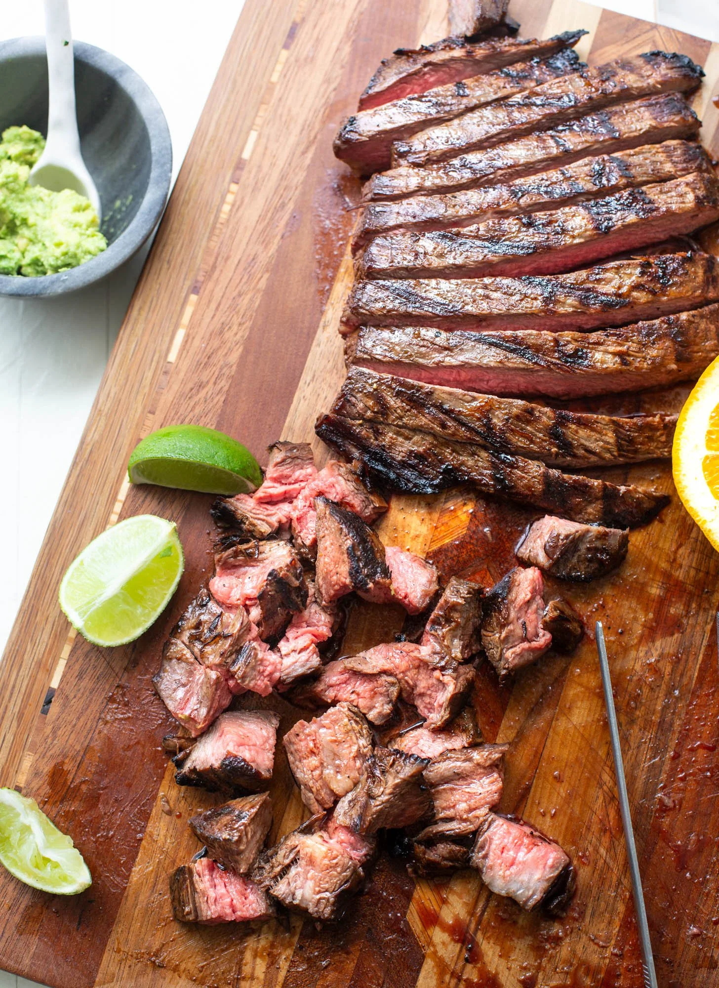 Grilled flank steak that has been diced to make carne asada tacos.