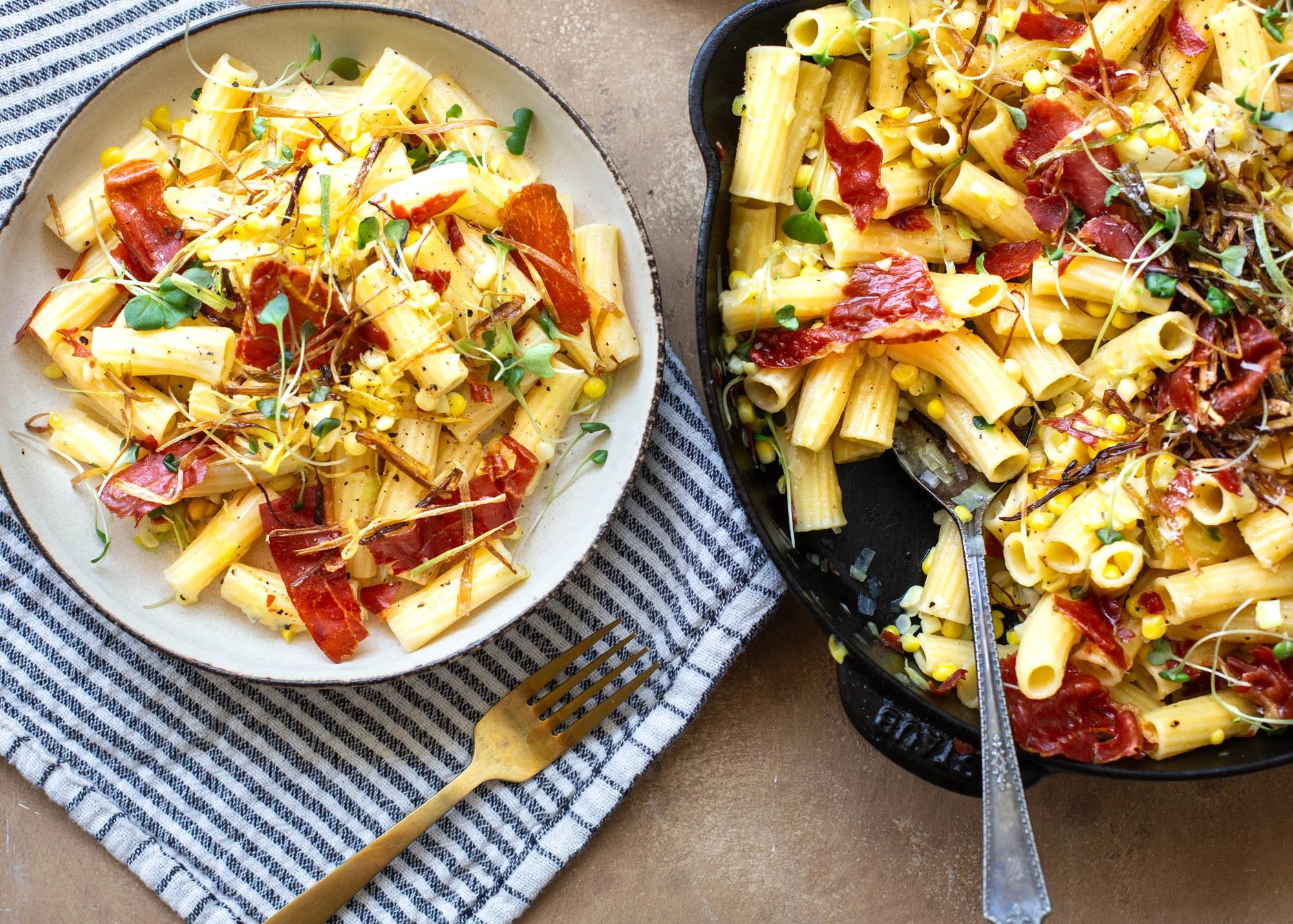 Close up shot of the corn and leek pasta served in a bowl.