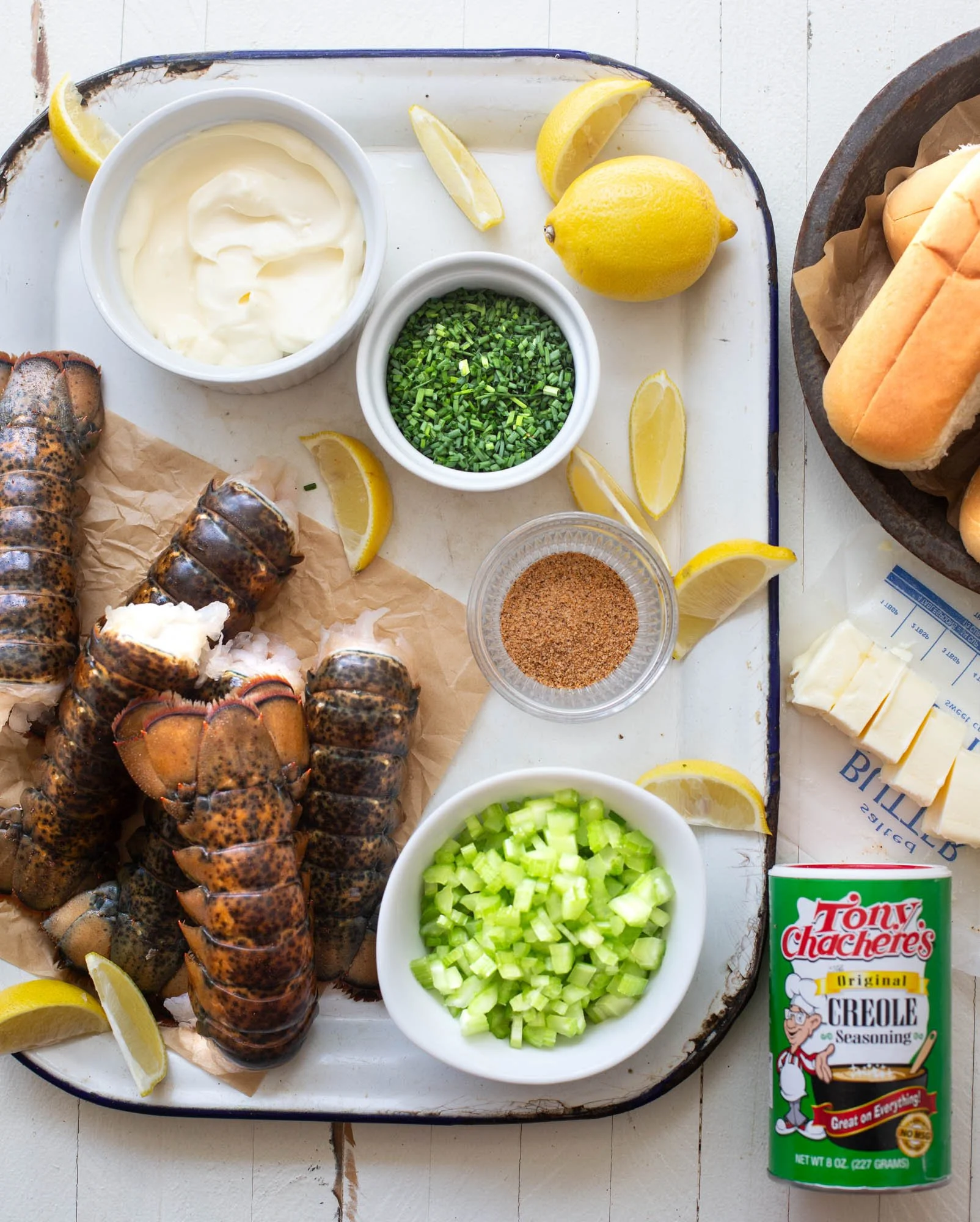 All of the ingredients that you need for grilled Cajun lobster rolls.