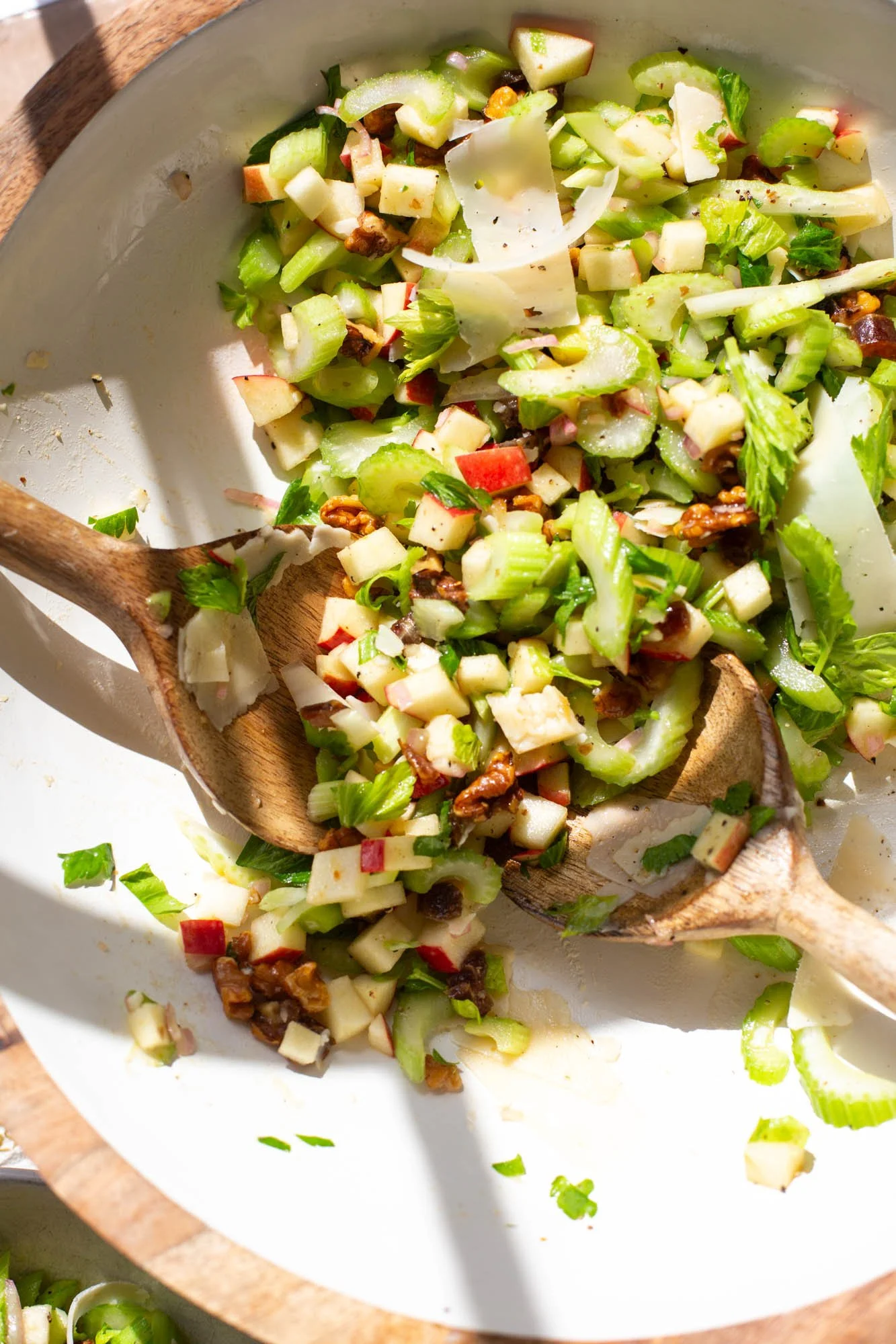 Fall salad with celery, apples, dates, walnuts, and parmesan.