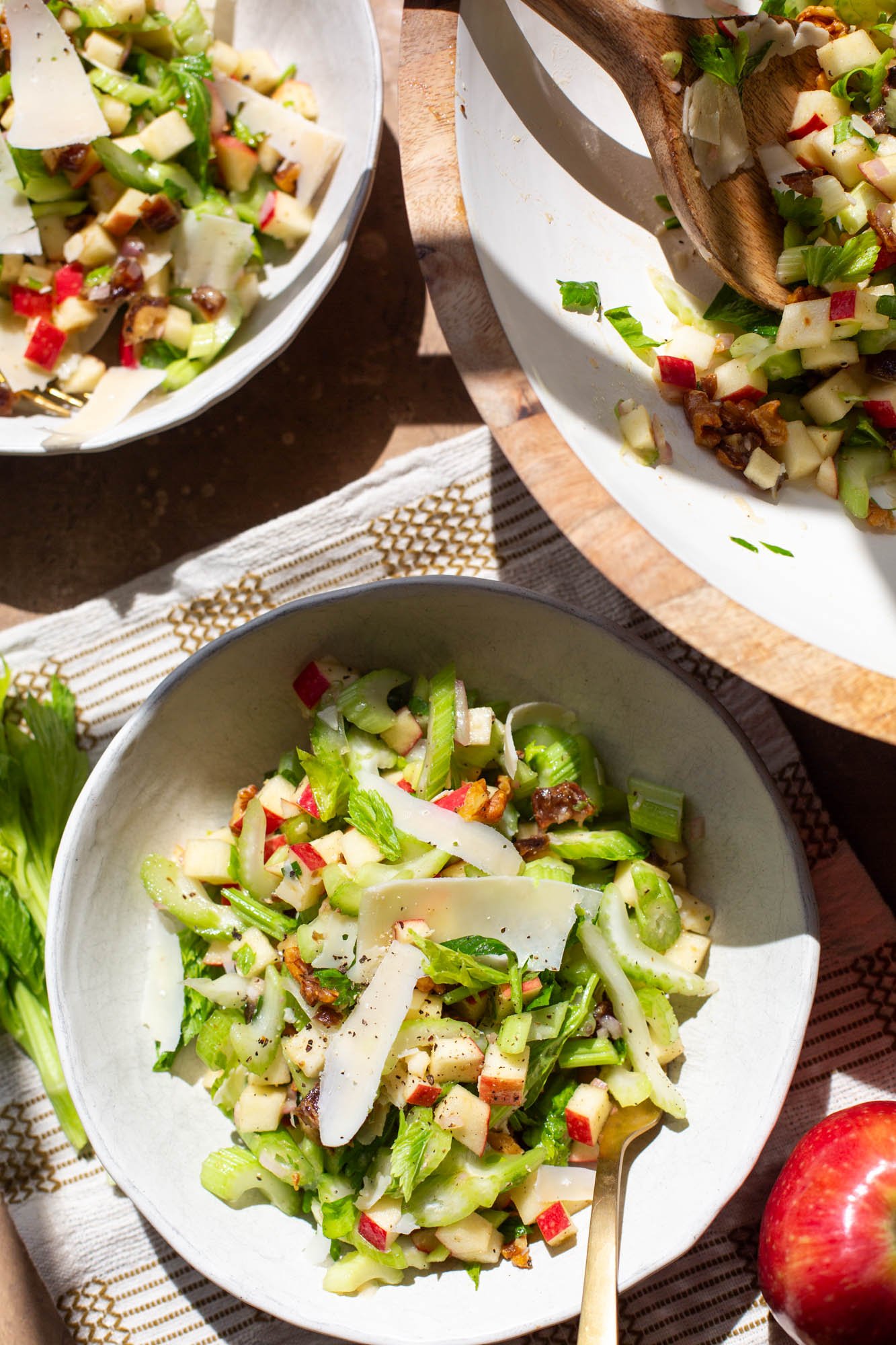 Serving bowls of fall celery apple salad.