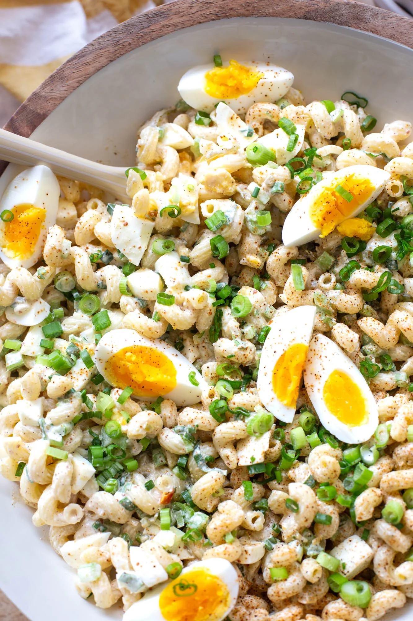 Large bowl of Cajun deviled egg pasta salad.