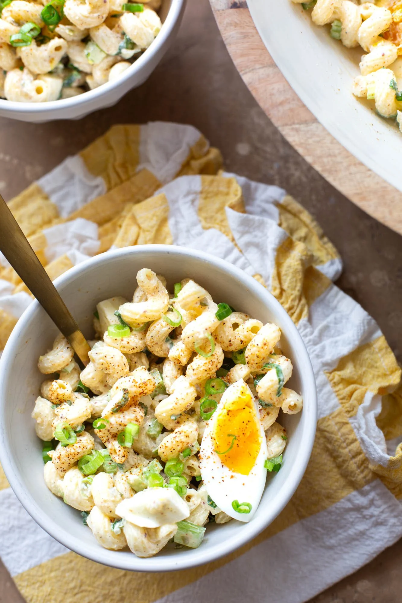 Bowls of Cajun deviled egg pasta salad.