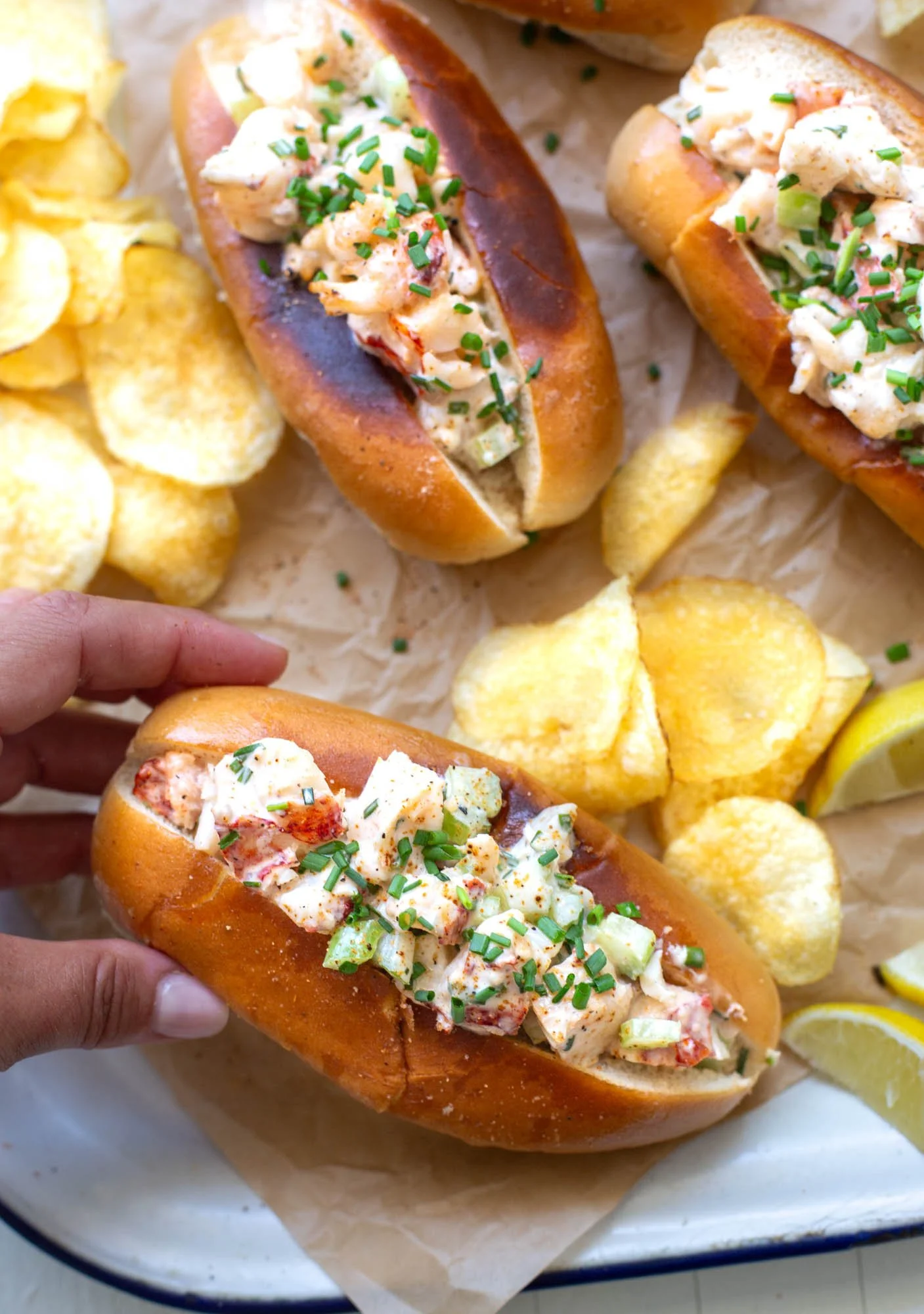 Grilled Cajun lobster roll on a platter.