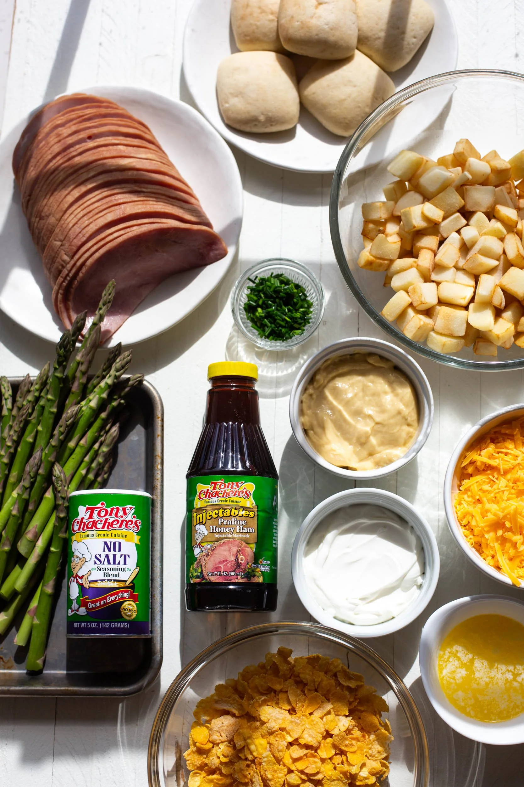 Ingredients laid out for a sheet pan Easter dinner menu.