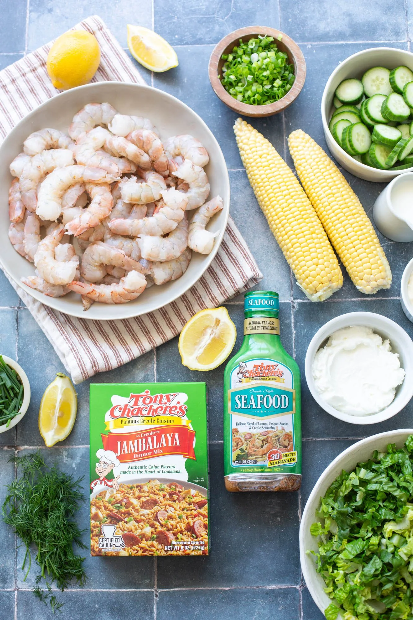 Ingredients to make a Cajun grilled shrimp salad with crispy rice.