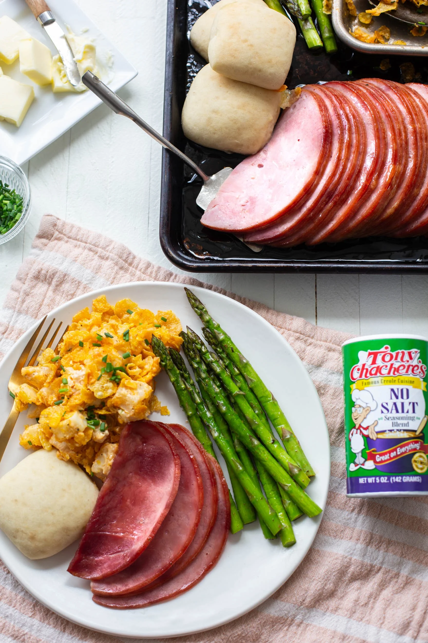 Sheet pan Easter dinner plated up and ready to serve for Easter dinner.