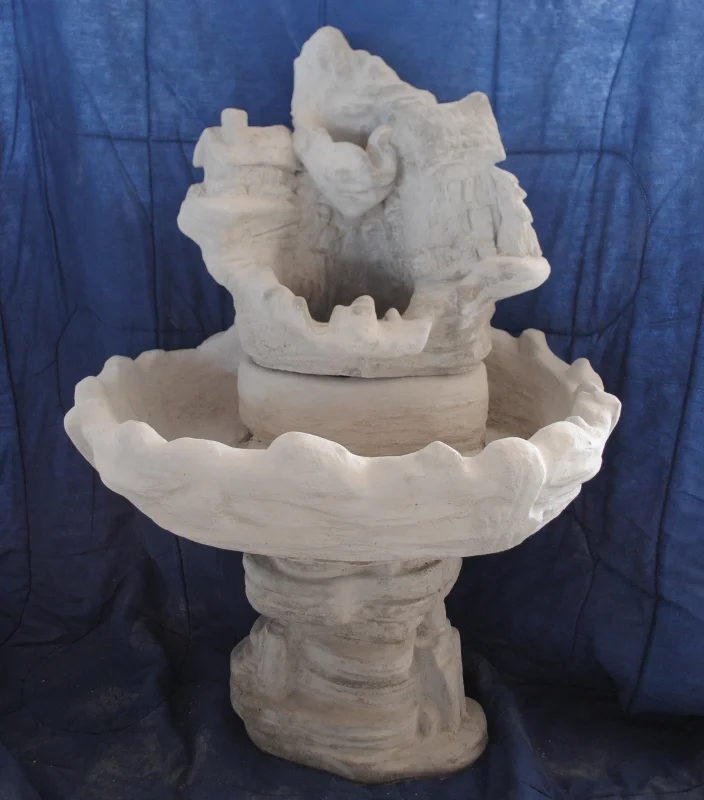 stacked-stone-with-houses-fountain (704x800).jpg