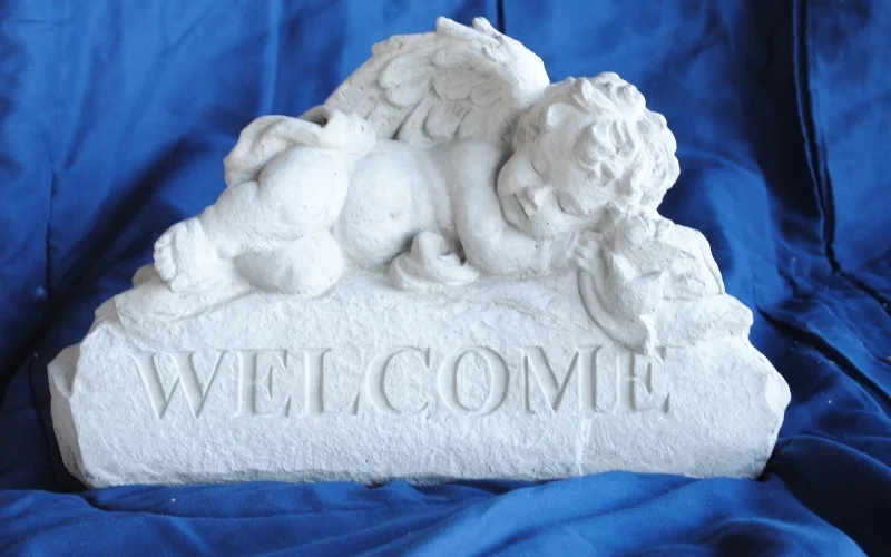 ---angel--new-laying-on-welcome-stone (800x500).jpg