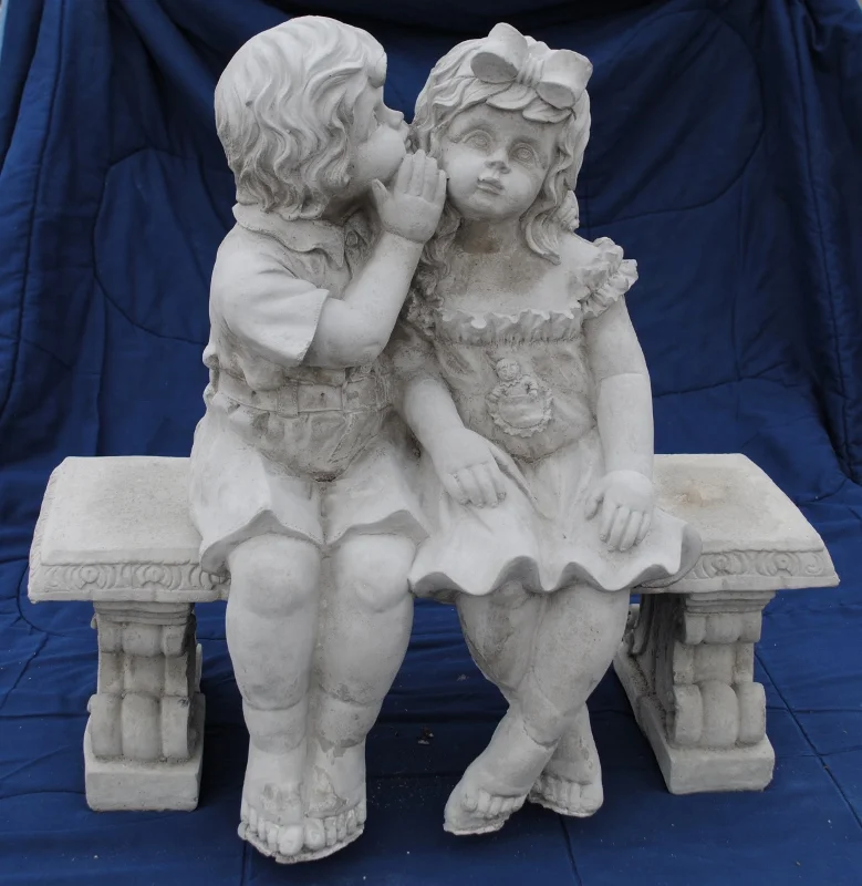 Boy And Girl Sitting On A Bench Garden Statue Garden Design Ideas