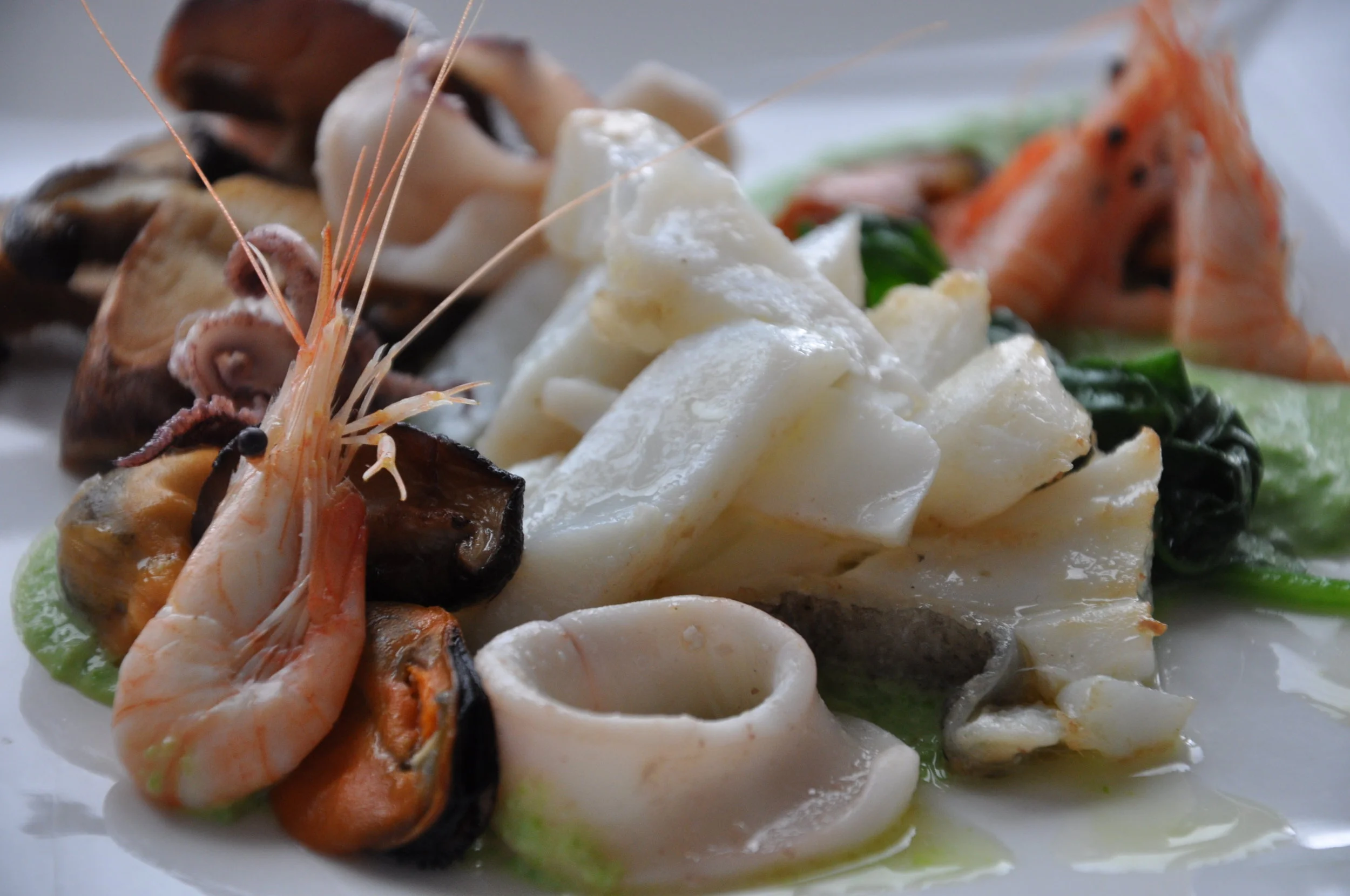 Mixed Seafood Plate with cod, shrimp, calamari and mushrooms - available on Shutterstock