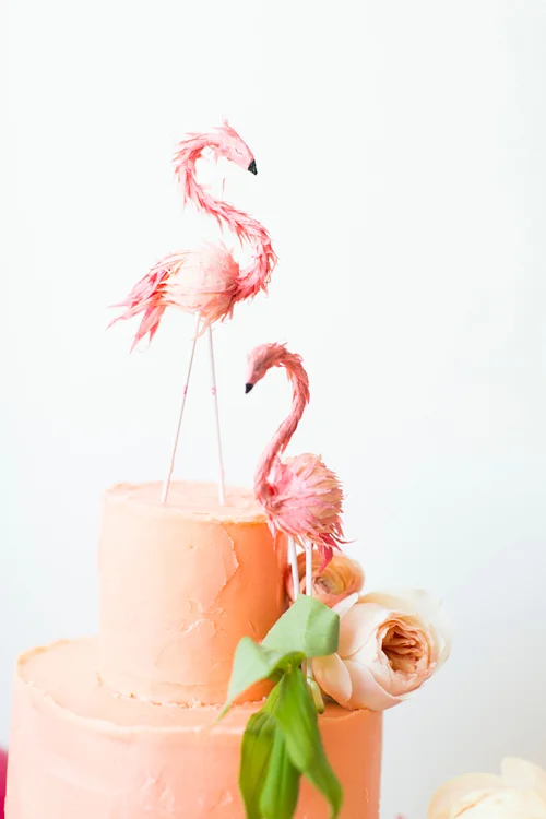 BHLDN is always my go-to for unique and very Style-Me-Pretty-esq items. These Flaming Flamingo Cake toppers , Styled by BHLDN and The House that Lars Built, are the cutest! 
