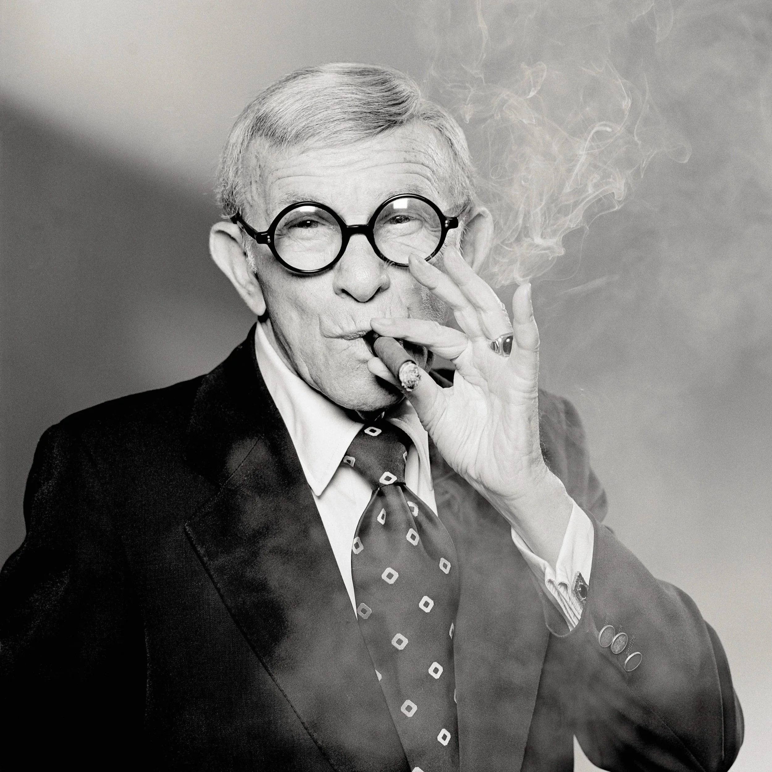 George Burns smoking a cigar