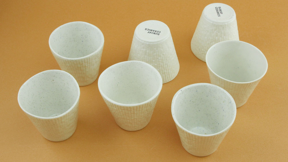Porcelain tea cups - 7cms tall x 7.5cms wide at top. Microwave/oven/dishwasher safe. $20 ea. (currently only have in slate grey - more white coming in jan)