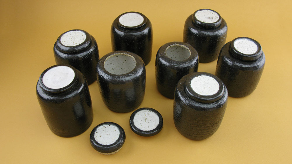 Lidded jar - various sizes but average 10cm tall by 7cms wide. These are great for salt and sugar. $30 ea.