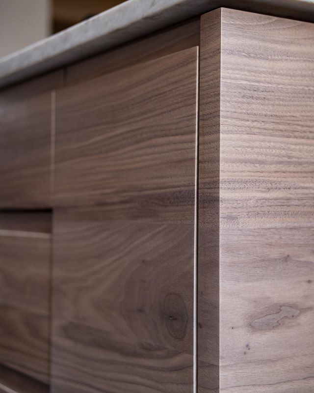 Close up detail of our veneers in walnut wrapping a corner and moving across doors and drawer fronts on a kitchen island. 
#customcabinets #walnutveneer #walnutcabinets #walnut #bayareahomes #alamedahomes #grainmatch #woodworking #woodgrain #woodisgo