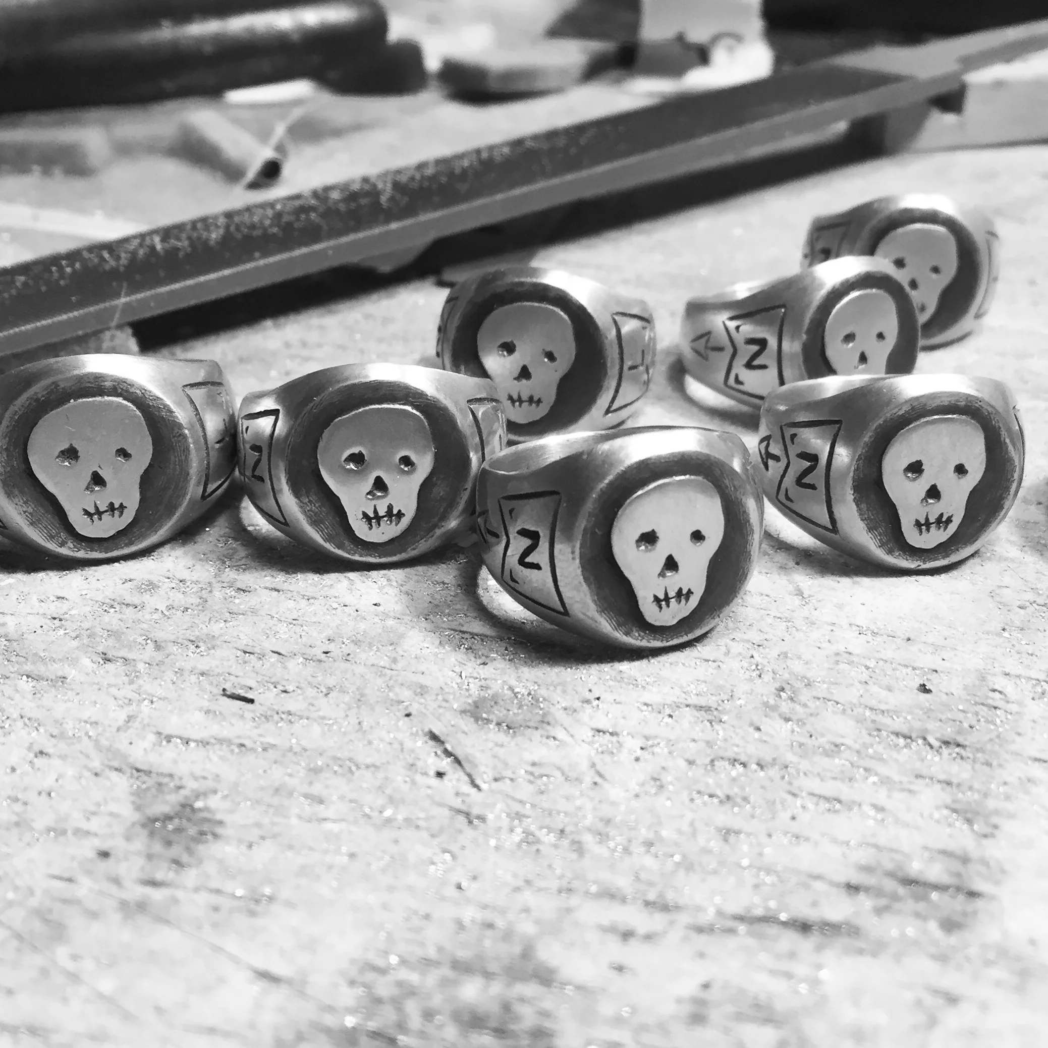 Logo Rings: Sterling Silver with Rustic Black Finish