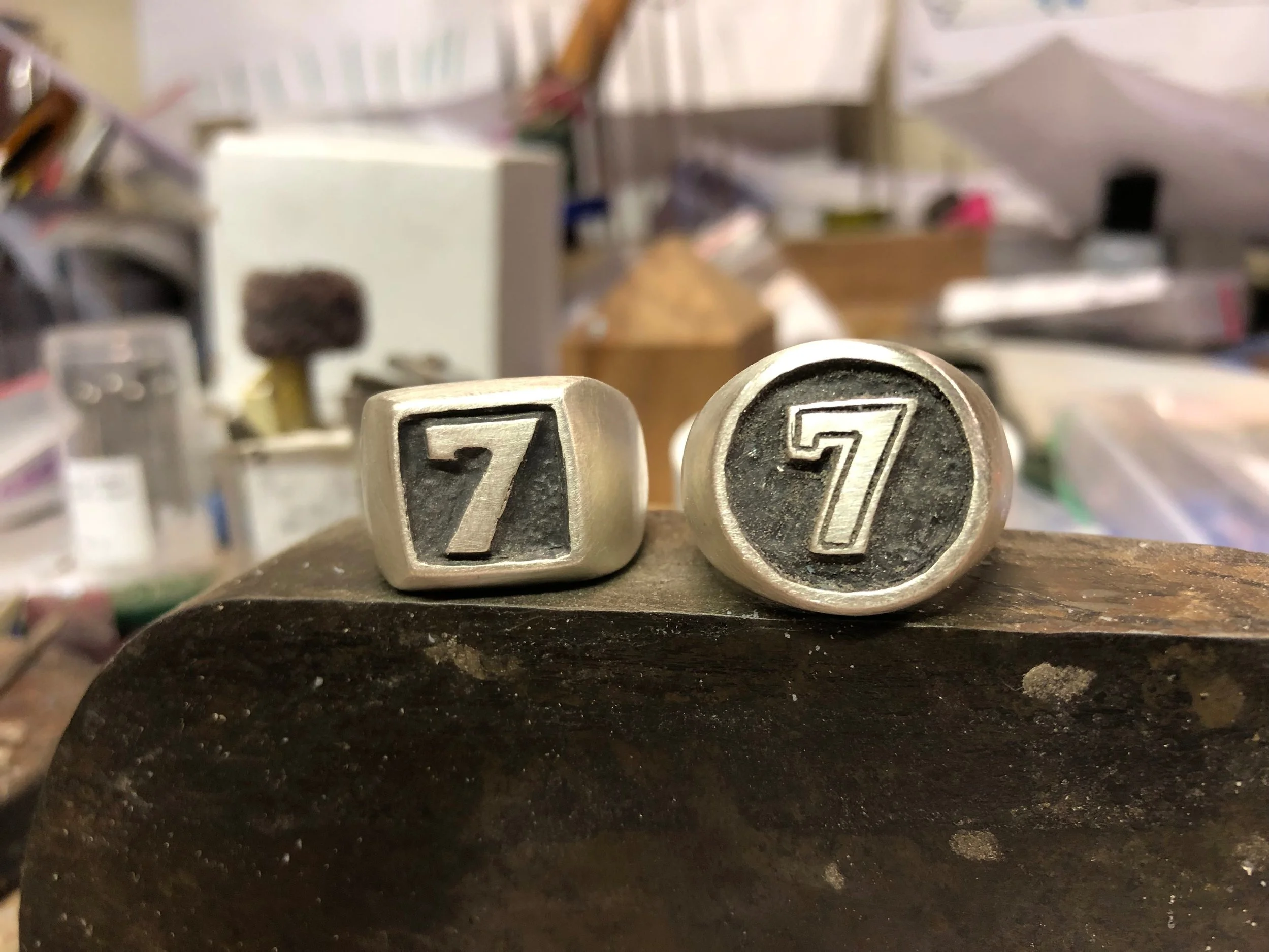 Logo Rings: Sterling Silver with Rustic Black Finish