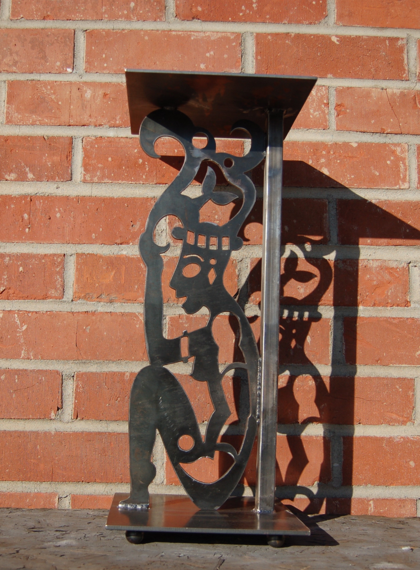  "Nefertiti" Single leg steel table. Cut from 1/4 plate steel. 