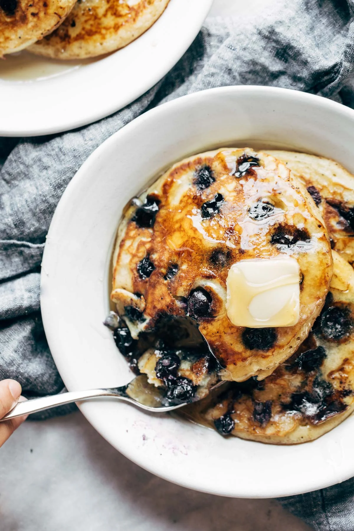 Taking-a-Bite-of-Blueberry-Pancakes.jpg