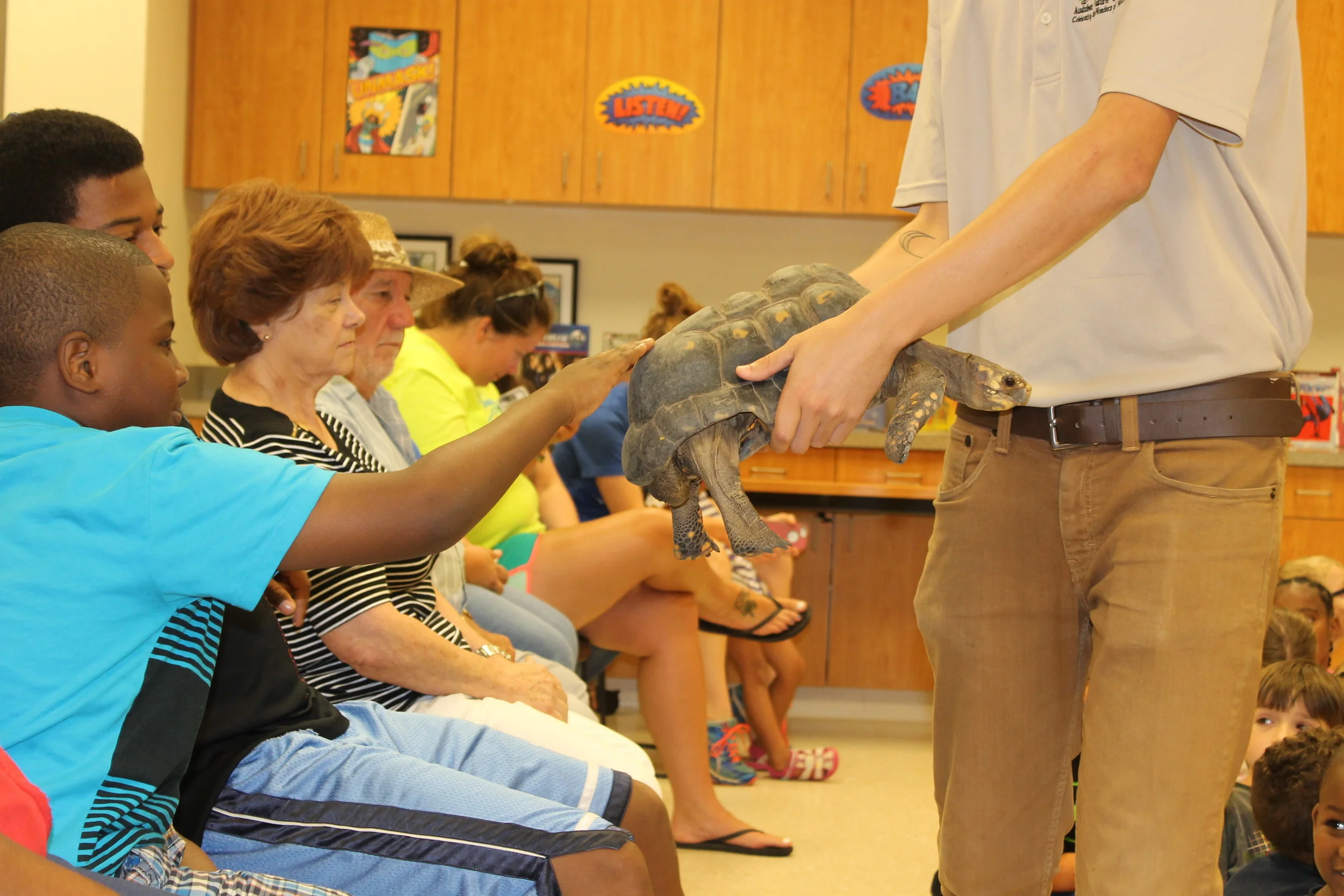 There were animals that visited from the Audubon Institute, Christian Stephenson from the Extension Service talked about the science behind superheroes, and visits from Community and Military Heroes.