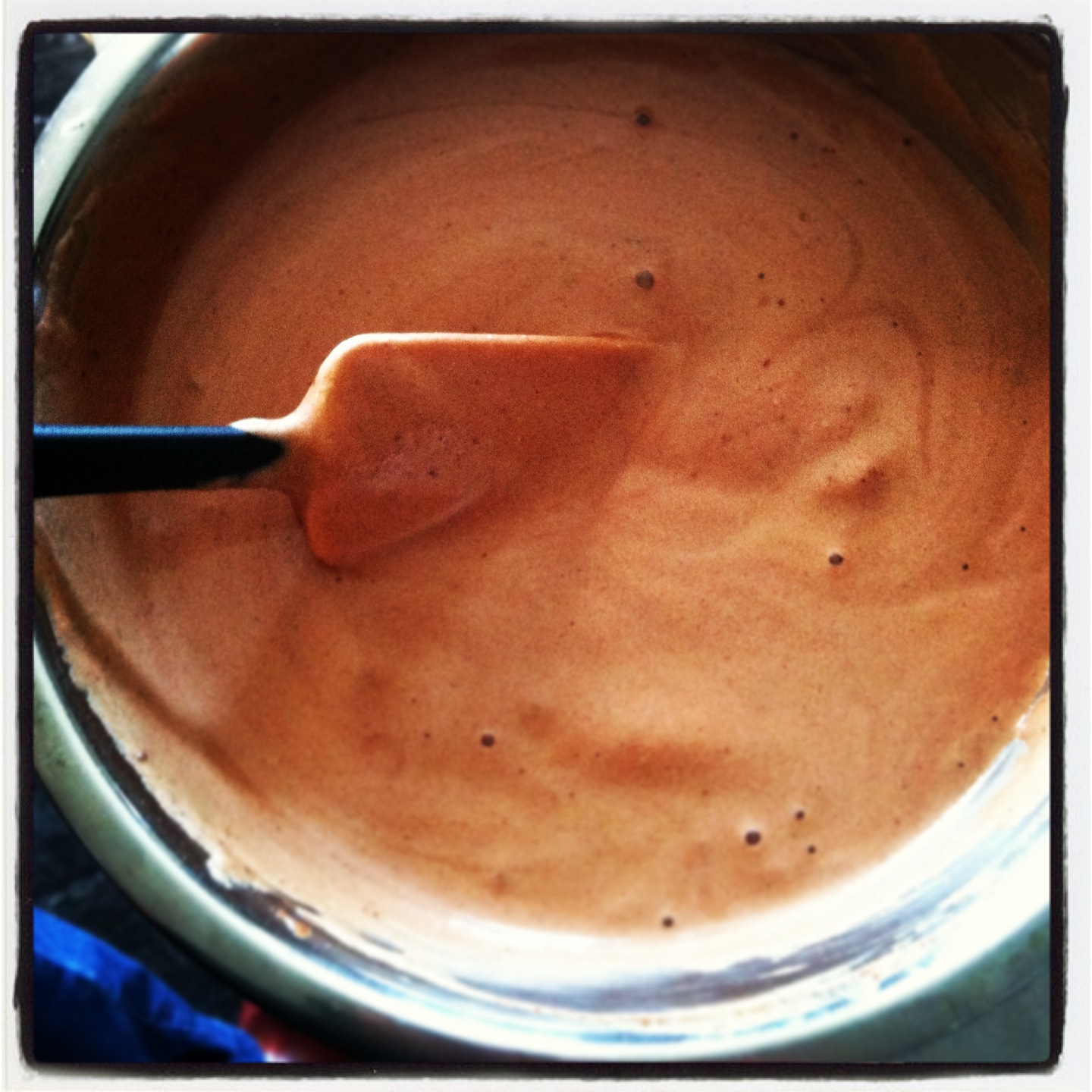 Mixing the egg whites into the chocolate mixture