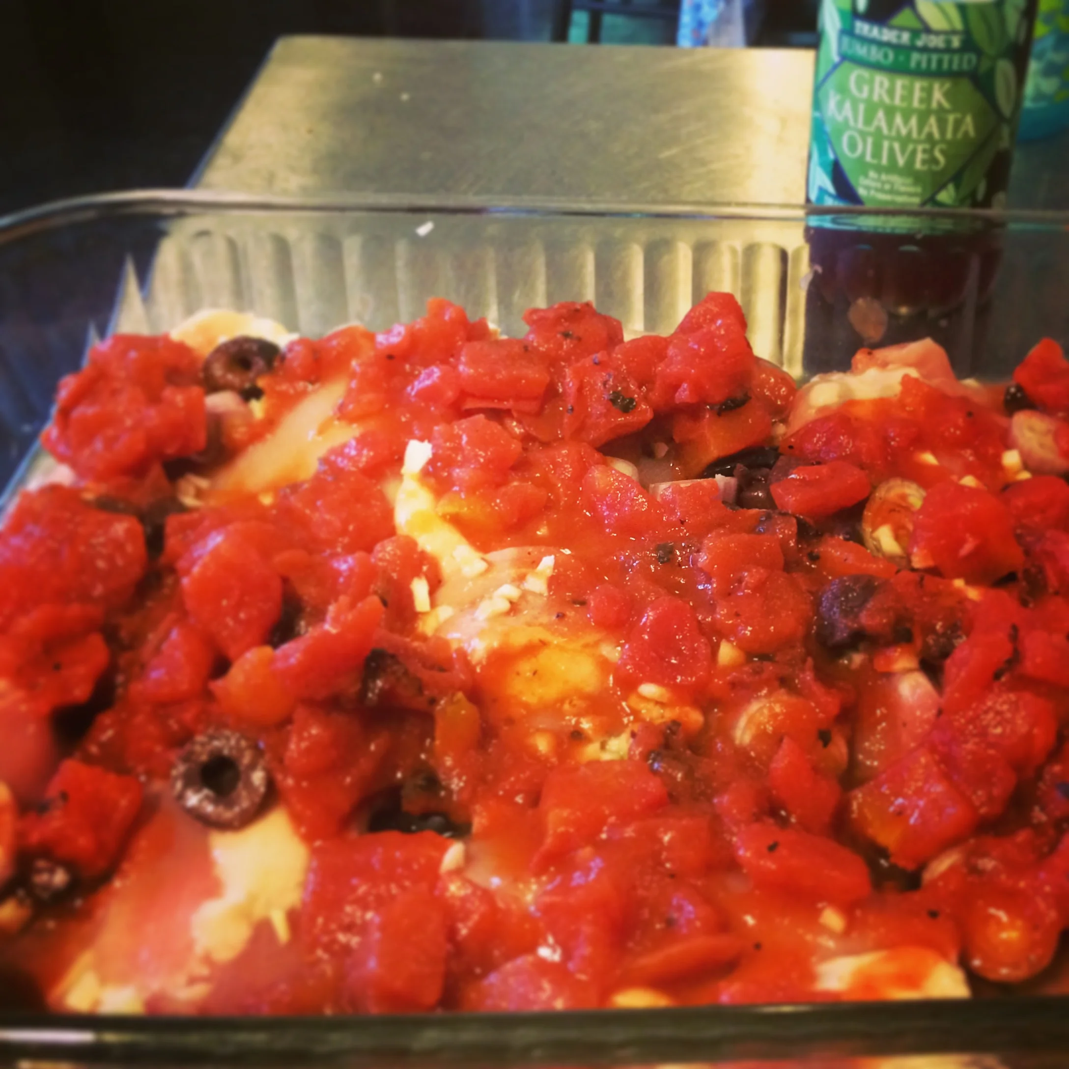 The seasoned chicken thighs headed into a hot oven!