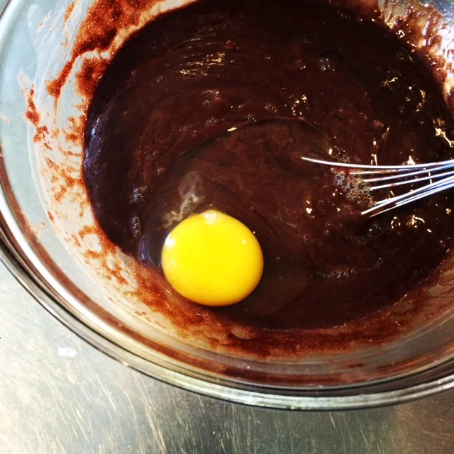 Lots of chocolate goes into this dense cake.