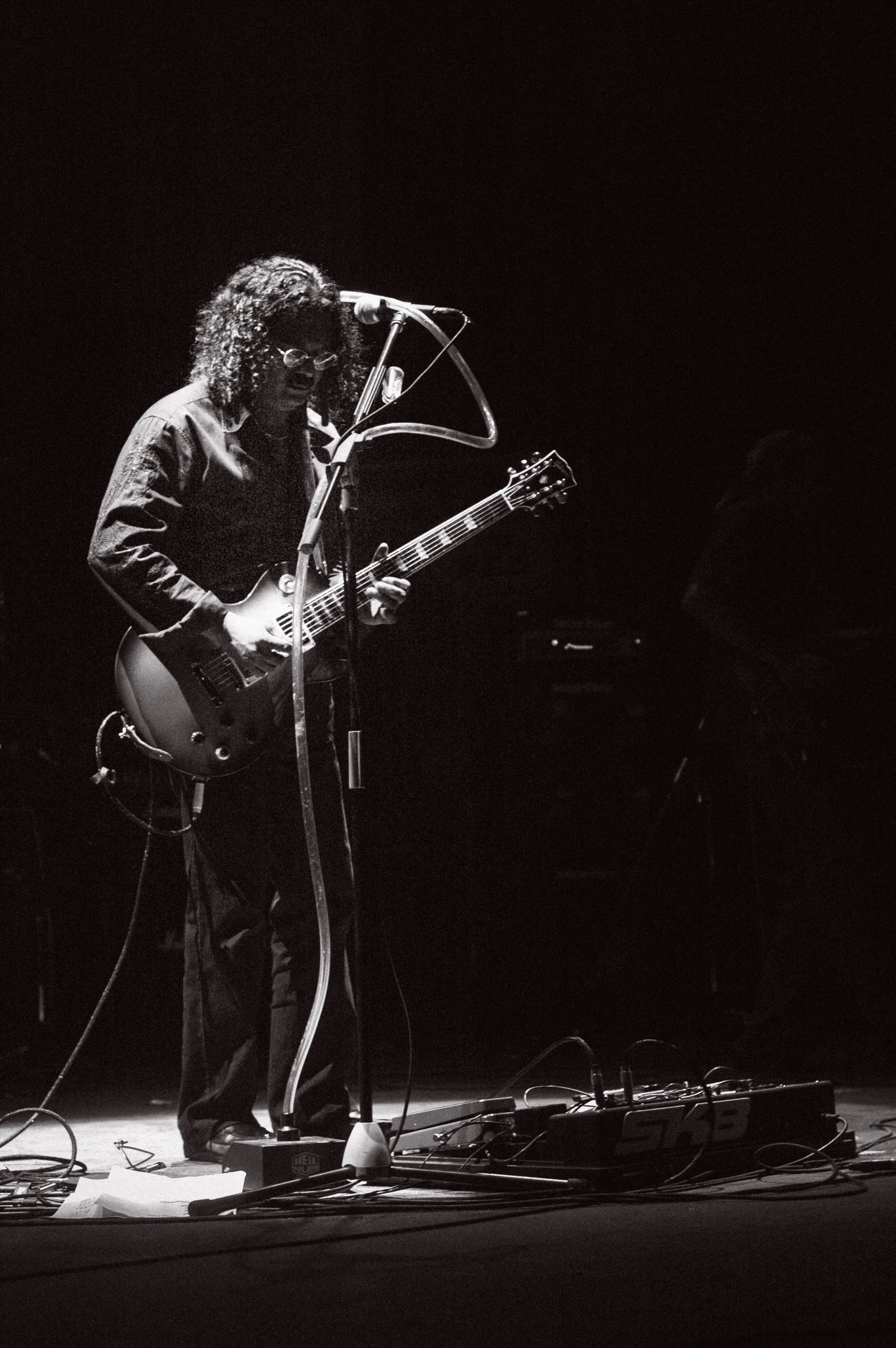 Ahmed “Fuloo” Nashid from Zero Degree Atoll tuning his guitar before the show begins