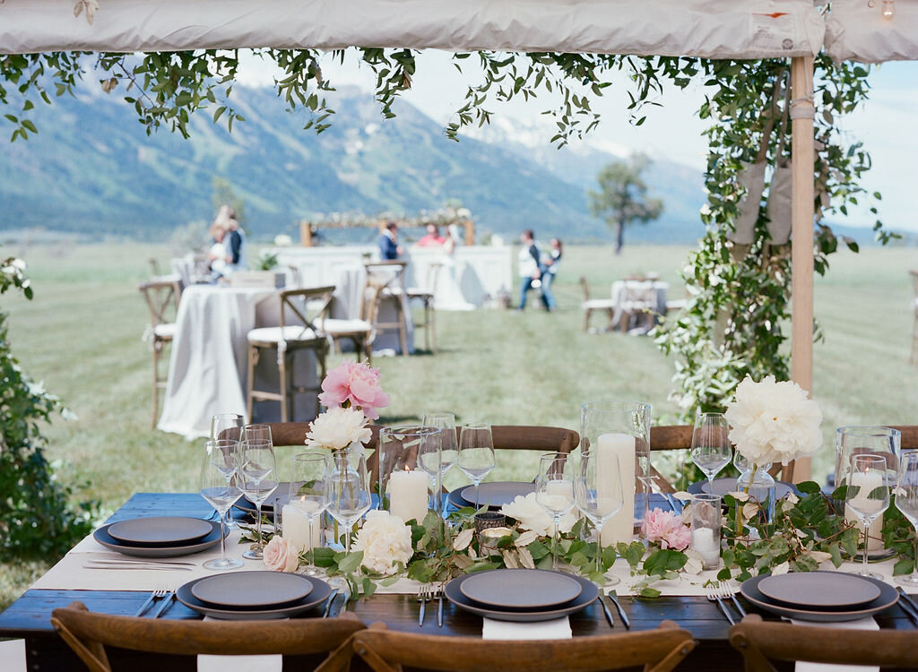 tent greenery reception florals .jpg