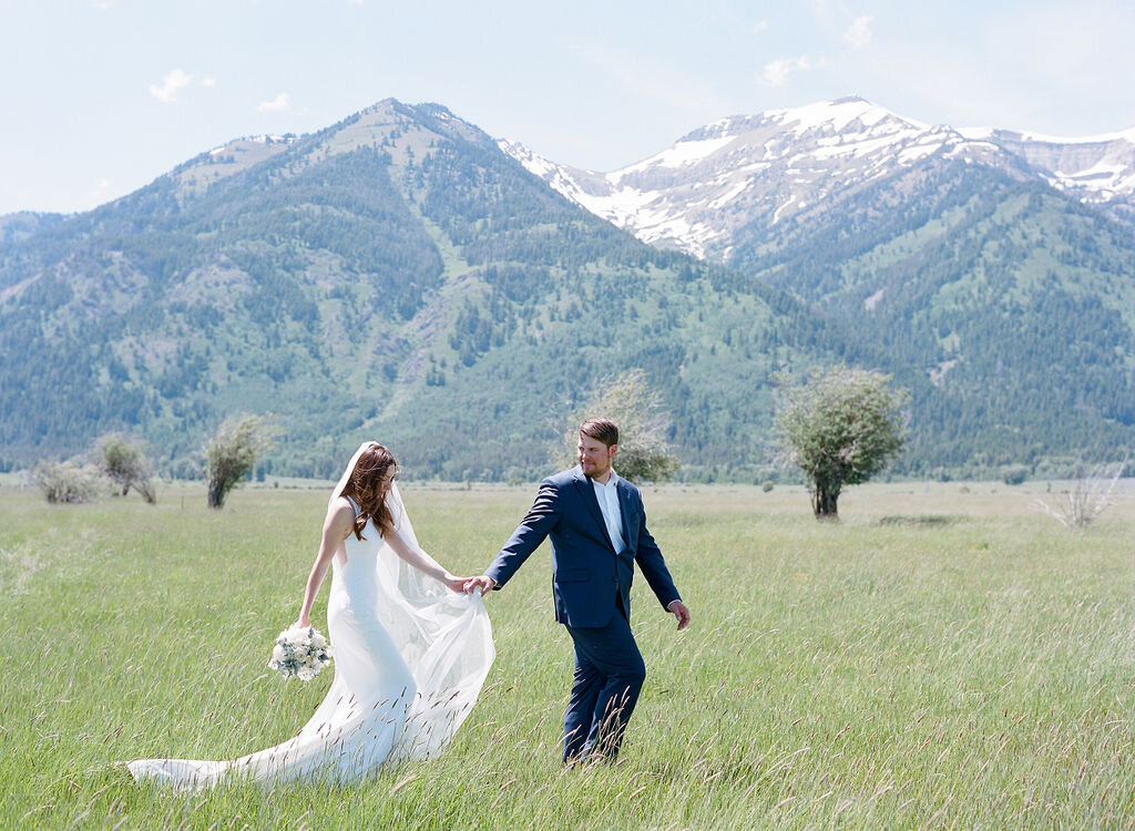 couple walking with mountains.jpg