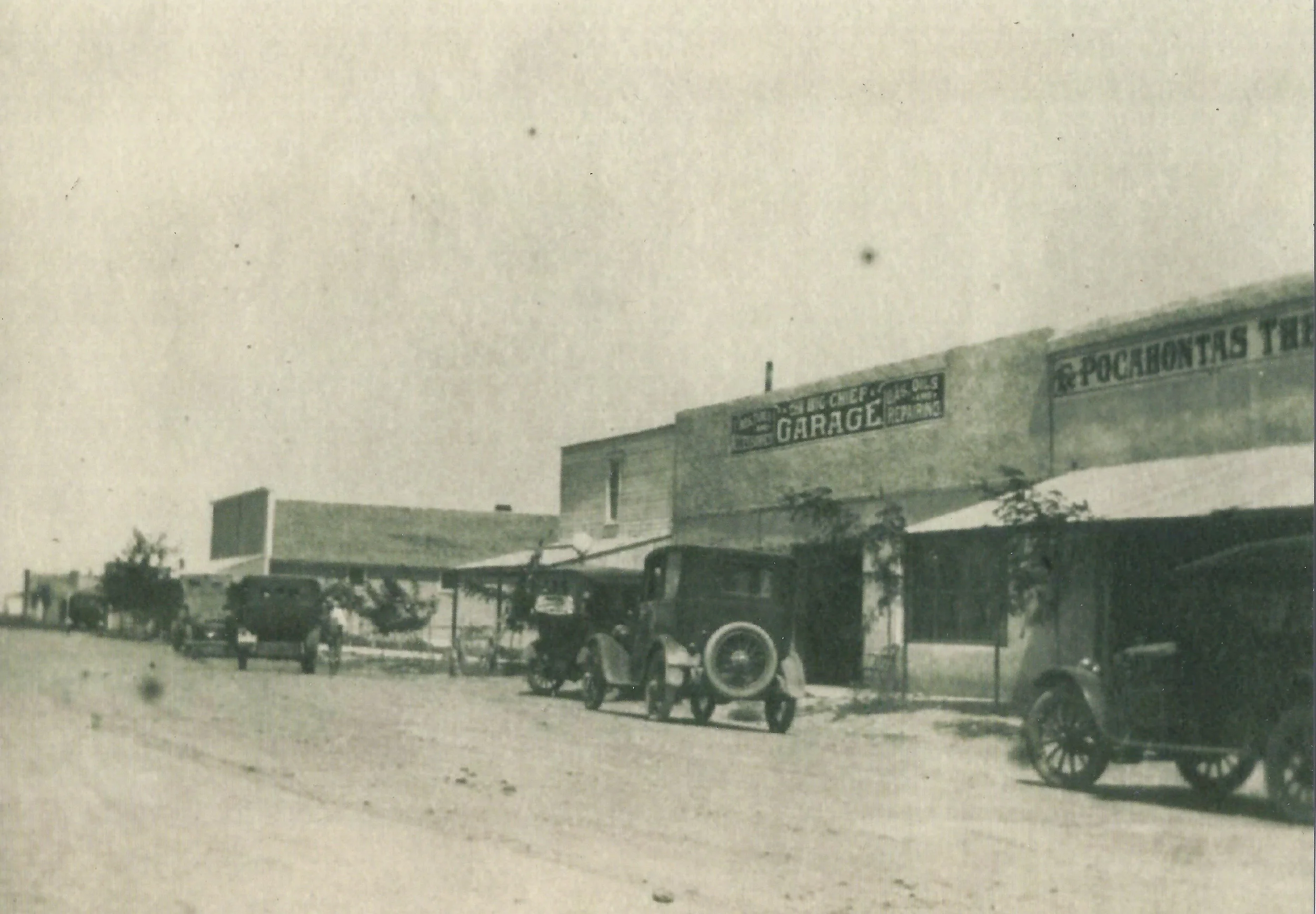 The Big Chief Garage and The Pocahontas Theatre on main street in Satanta, Kansas.
