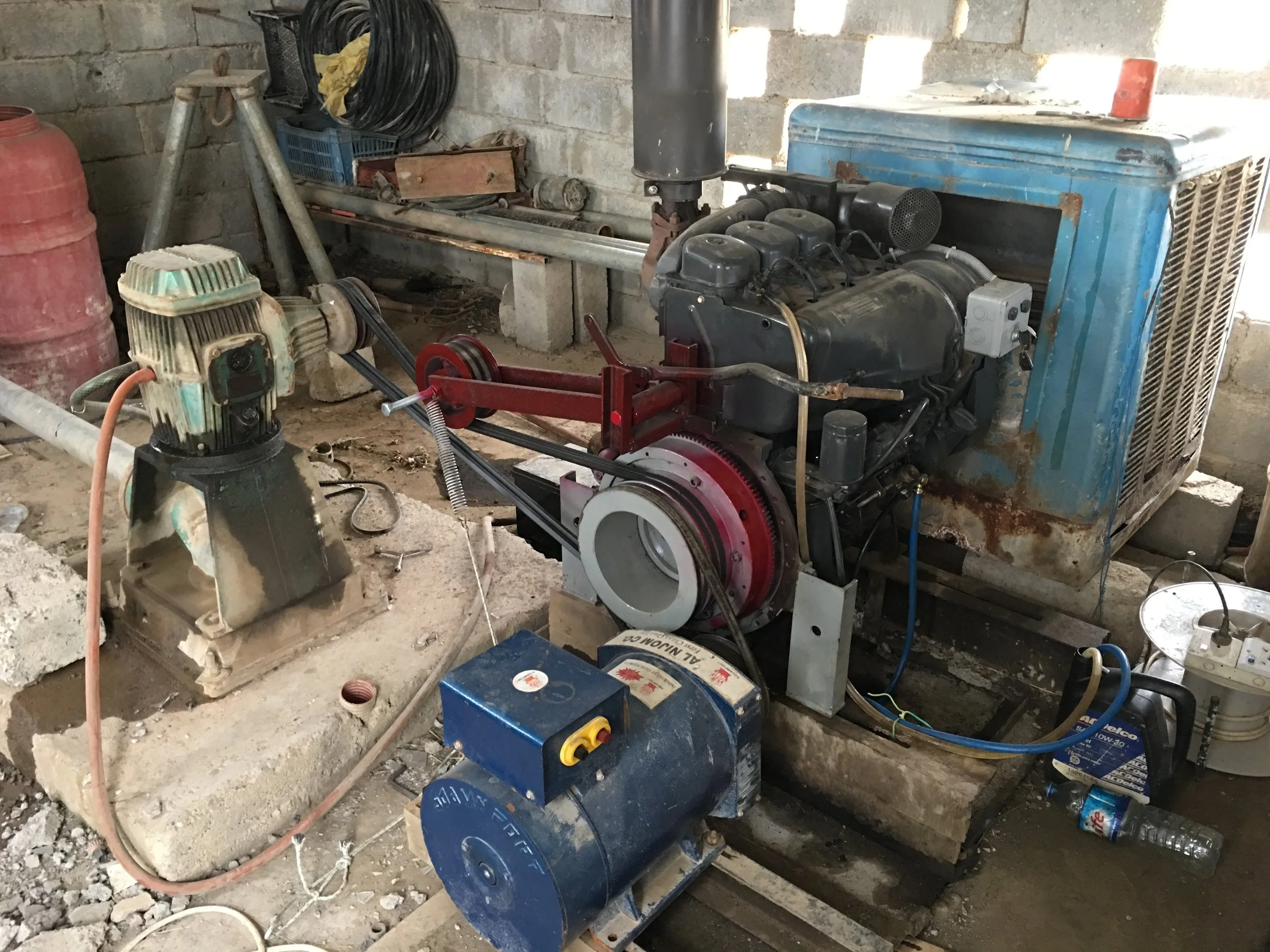 New Engine and electric motor to pump water at the farm.