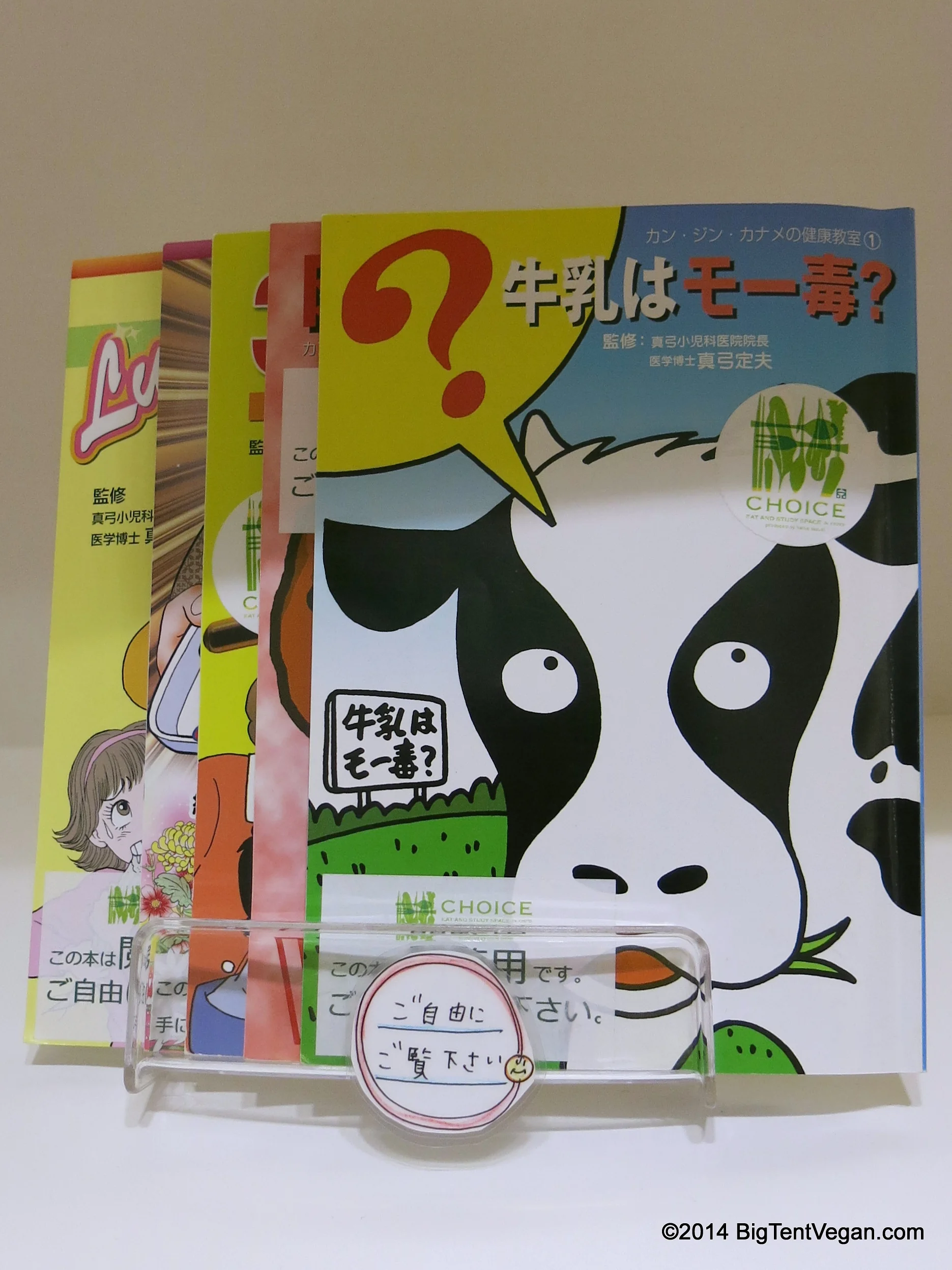 Comic books explaining the dangers and health risks of consuming cow's milk and other animal-based proteins.