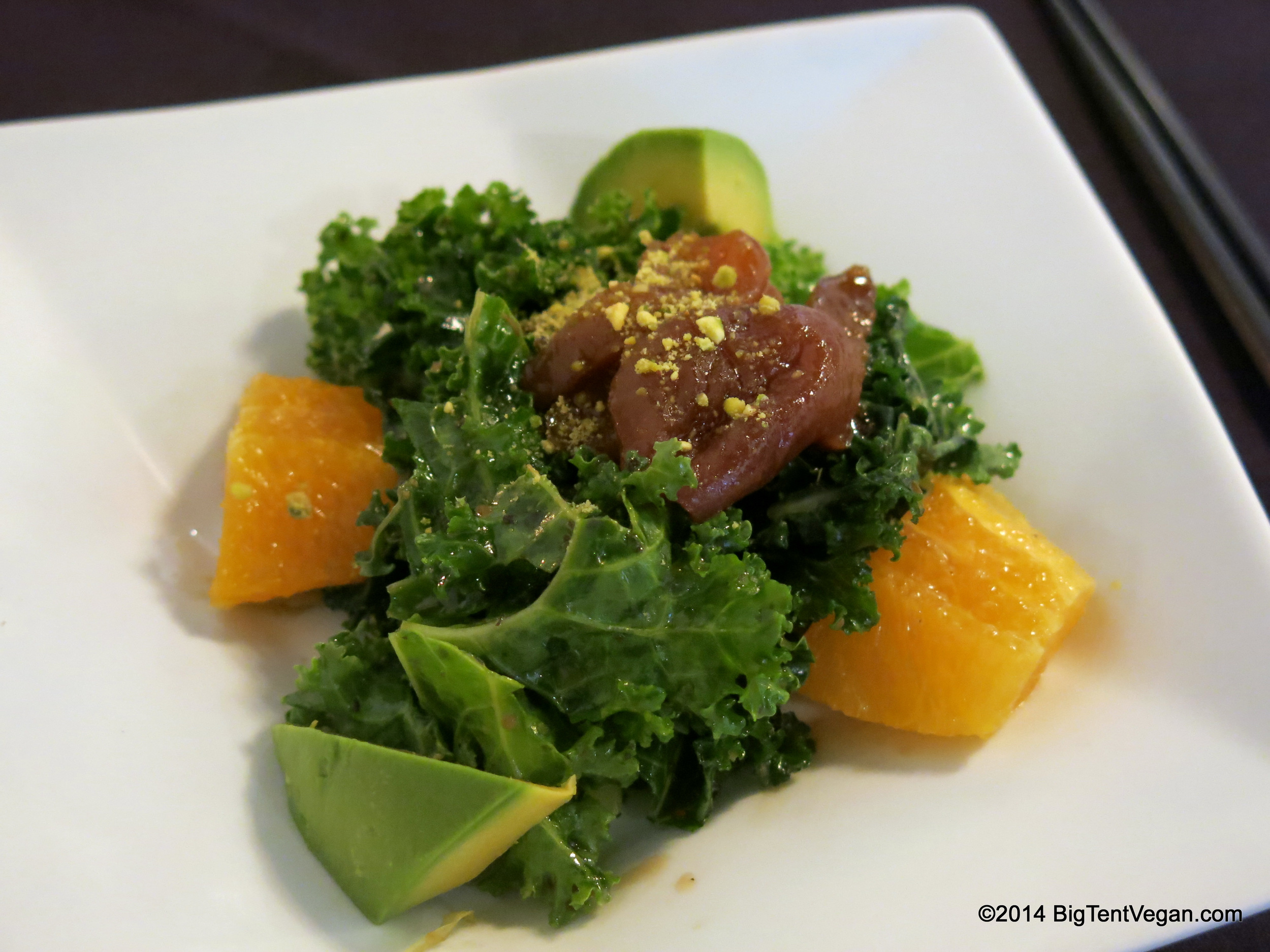 Course Five: Apricot Kale Salad with Lemony Soy Vinaigrette, Dried Apricots, Avocado, Oranges, and Crushed Pistachios