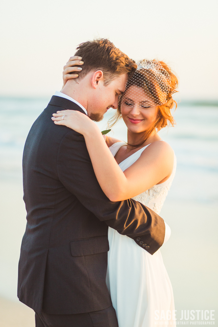 4S0A8690- bride and groom in carlsbad pelican point .jpg