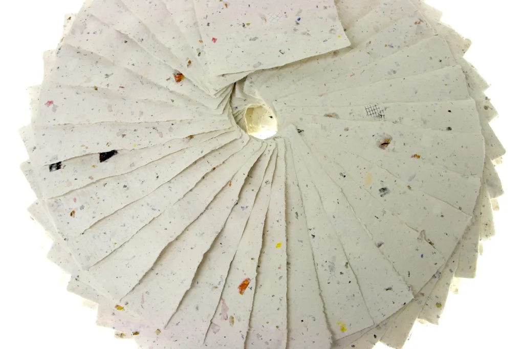 Handmade paper, recycled from offcuts and old artwork. 2008.