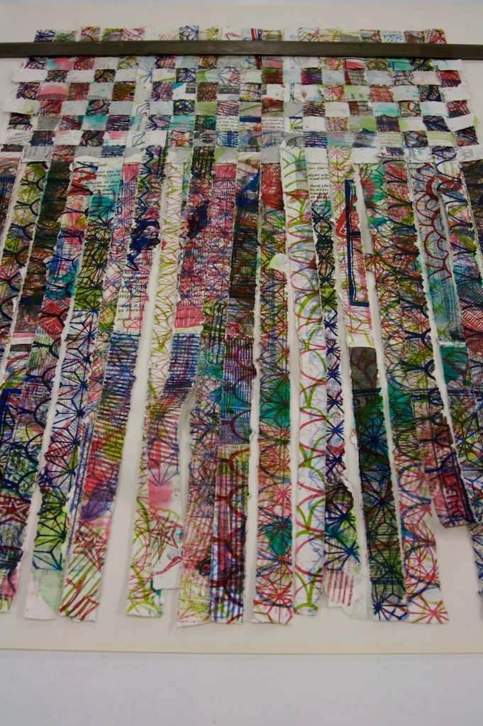 Weaving handmade, hand printed paper strips. 2008.