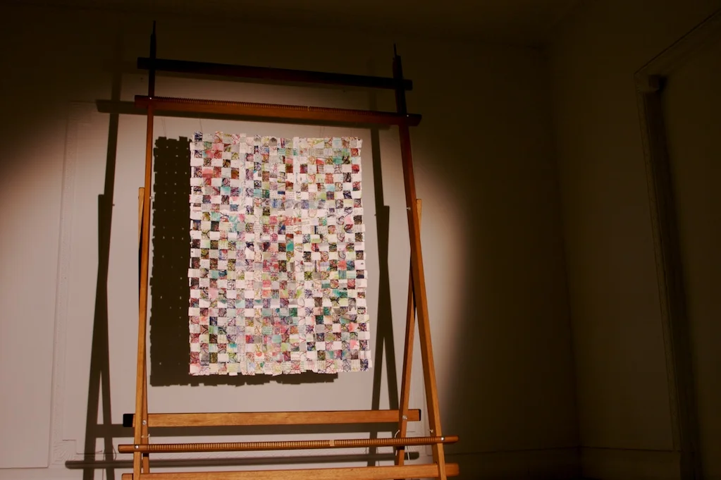 Handmade, printed and woven paper strips on tapestry loom. 2008.