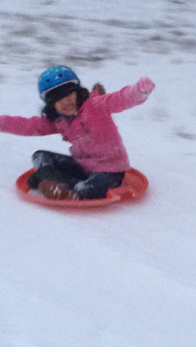  Girl 2 loves sledding! 