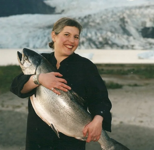 Salmon on ice! Taken in front of Mendenhall Glacier with 30# King salmon. (publicity photo for the Great American Seafood Cookoff 2004)