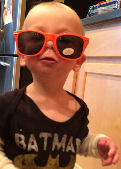He may look innocent in his sunglasses but he is very busy and gets into EVERYTHING!