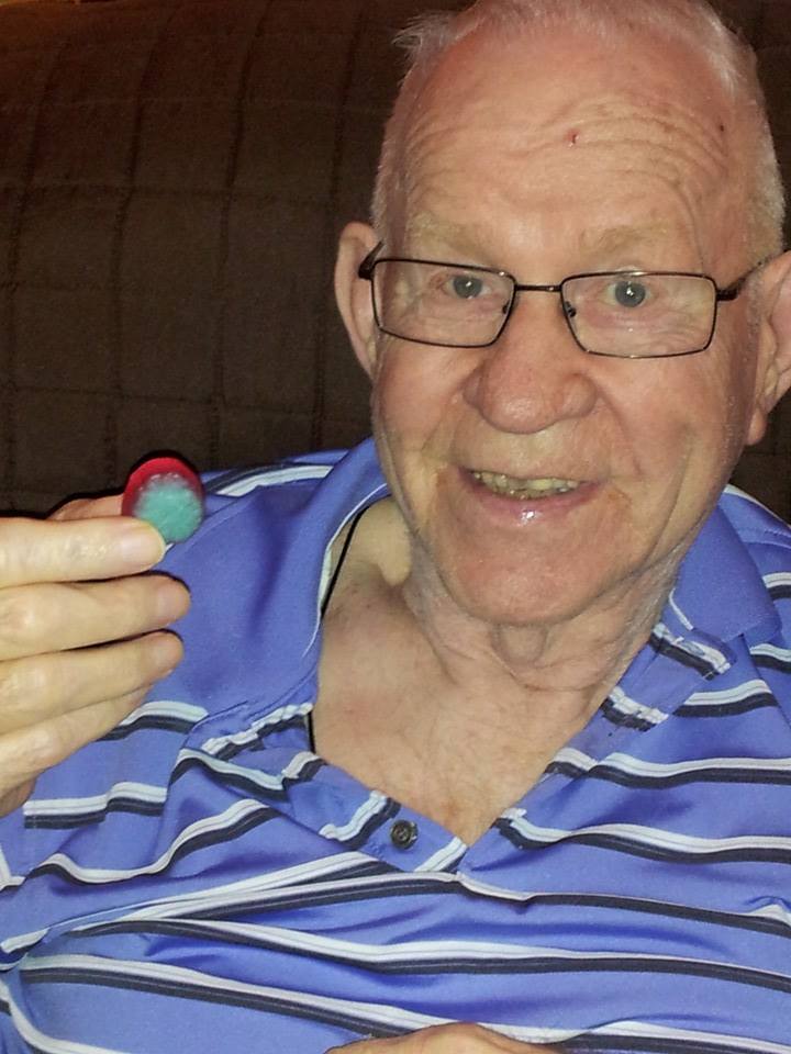 I also have great photos of Dad about to chomp into gummy eyeballs and bloody fingers.