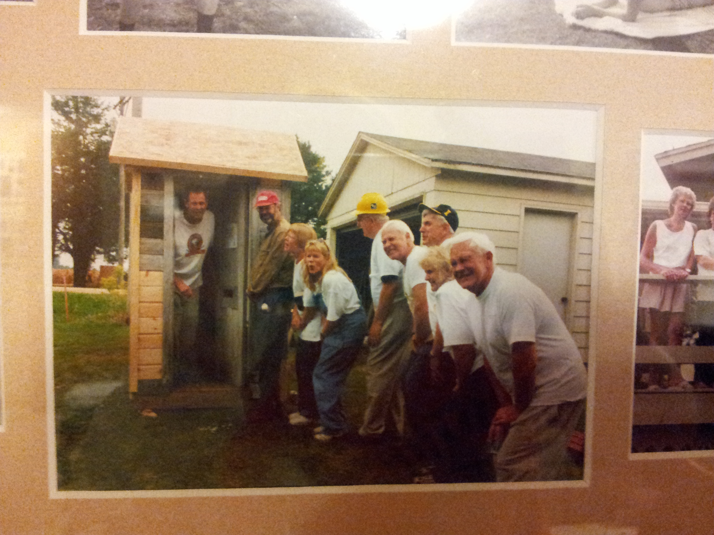 Here are many wacky Voigtses with their newly raised outhouse - finally! - ready to try it out. Several Allison townspeople drove by the farm that day to see if we really were having a rebuilding party....