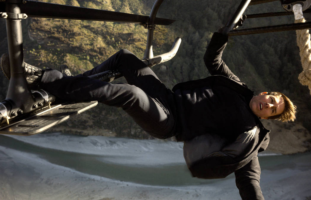 I have no idea what Ethan Hunt/Tom Cruise is doing here. but whatever it is, it's something he probably shouldn't, if only for the sake of his aging back.