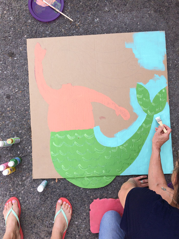 That would be my mom making a special guest appearance on the blog, painting a lovely blue mermaid background. Thanks, Mom. Oh, and I used this tutorial to draw the mermaid . 