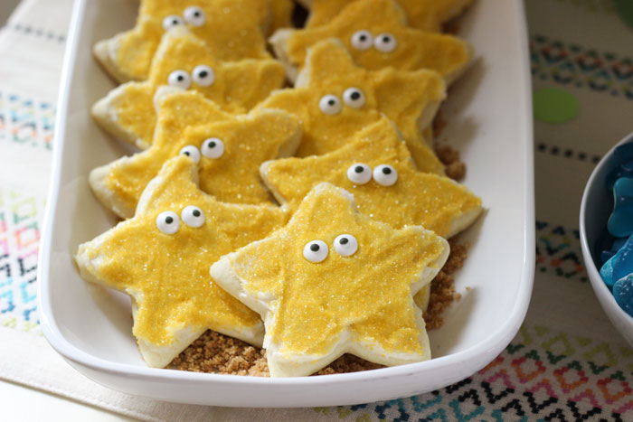 Starfish cookies spotted at The Decorated Cookie . I used this recipe for cookie doug h . Typically, I use the cream cheese frosting but used buttercream instead. I'm going back to cream cheese next time but my frosting choice did not prevent these cookies from entirely disappearing during the party. 
