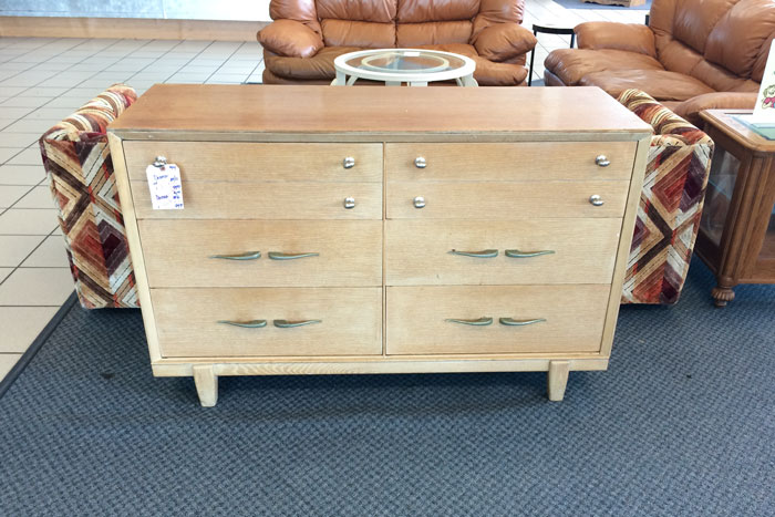 Coat of paint and new handles? This could make a great TV stand. Except that it doesn't fit. 