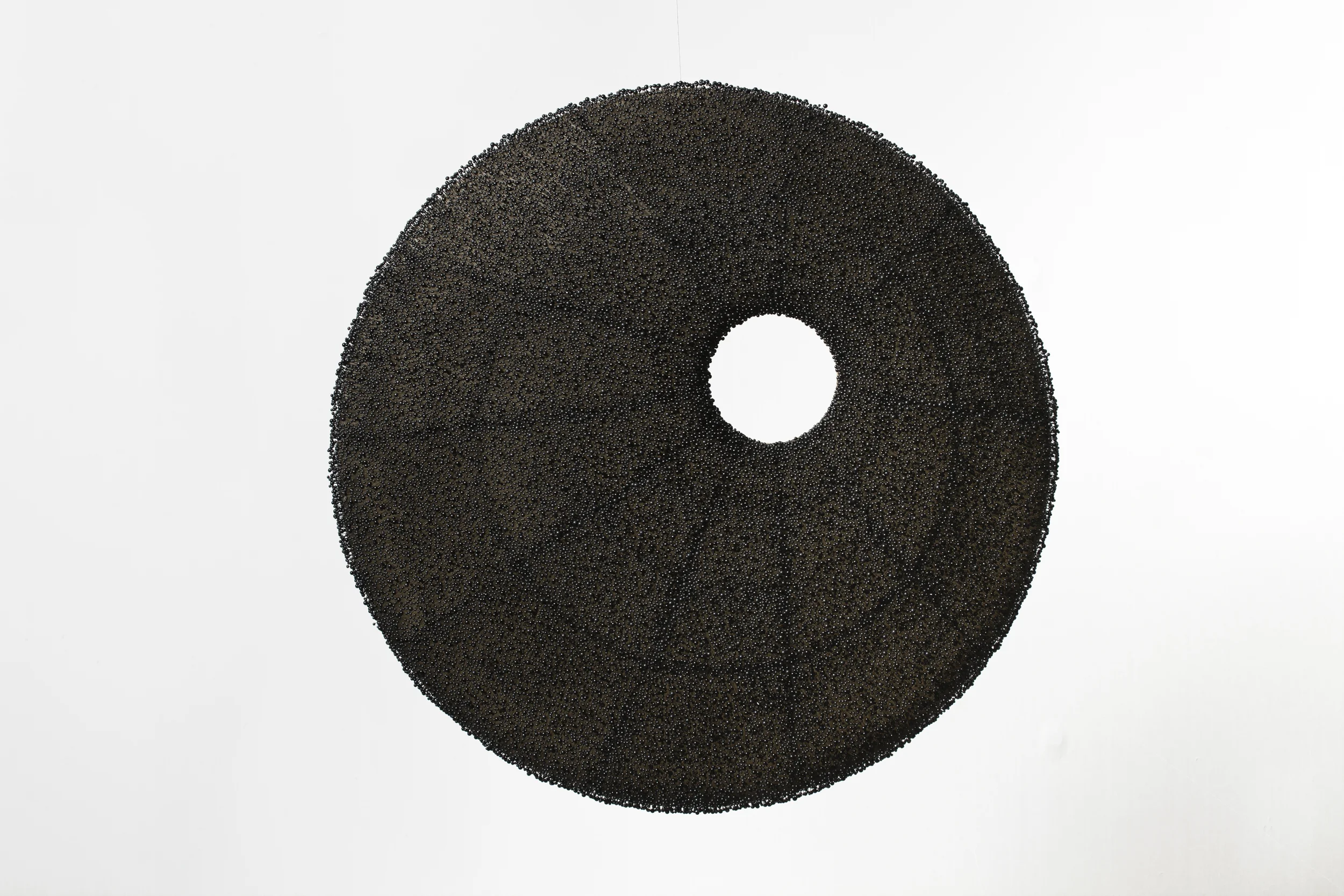 Front View: Elements of Ambivalence 1 glass pins on fabric and steel 26" diameter 2013